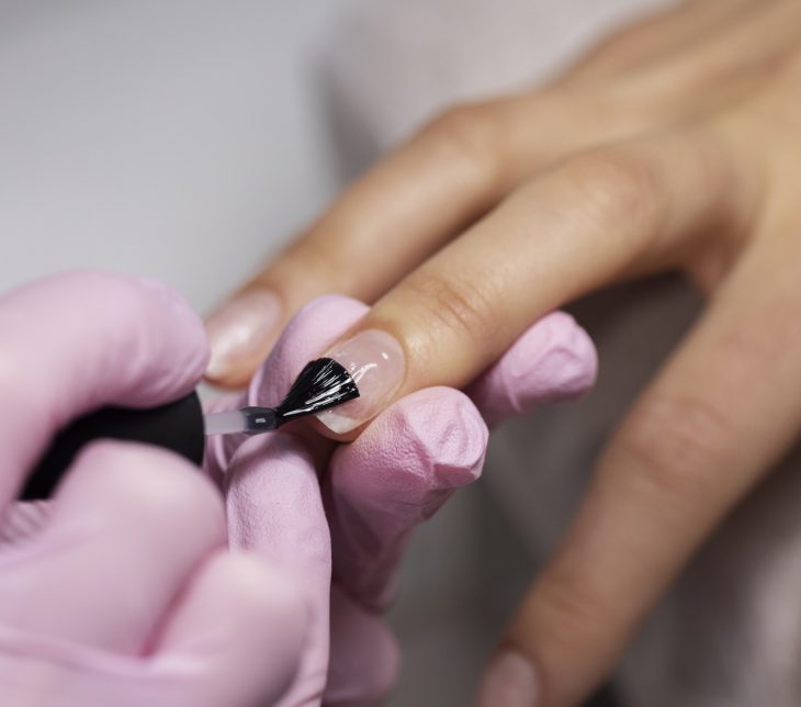 nail-art-professional-working-client-nails